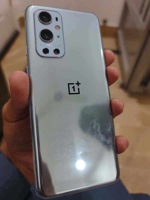 oneplus 9pro.   12/256 siver color, 10/10 condition 1