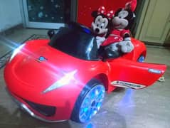 Kids ferrari car,swing mode,lights in wheels excellent condition