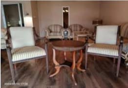 Pair of chairs with round table