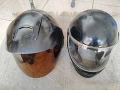 two helmets in useable condition for day and night