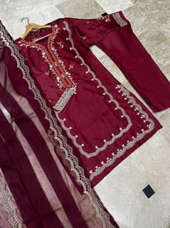 3 PCs women stitched silk suits. embroidered dupatta pattern