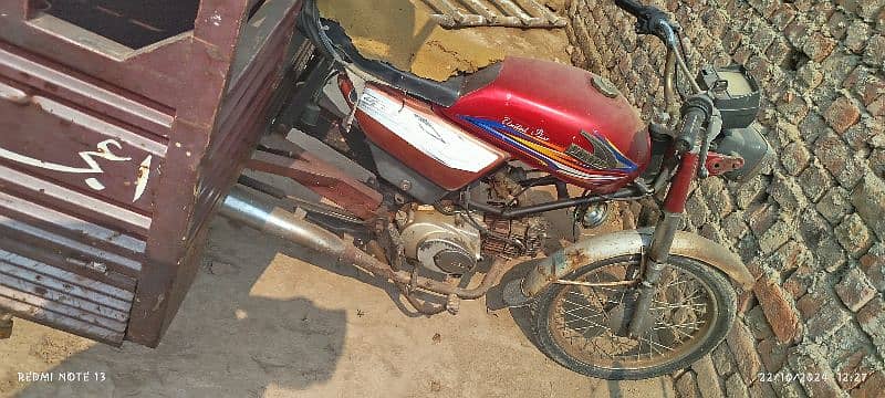 riksha 100 cc 3