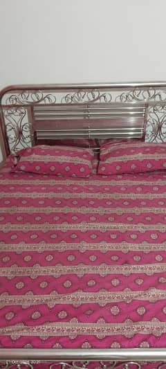 bed and five seater sofa