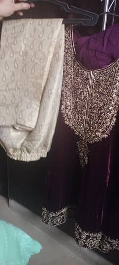 velvet shirt with lehenga dupatta. It has trousers also.