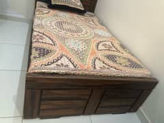 brown wooden bed