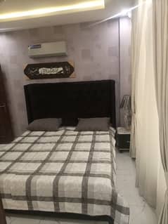 2 BEDROOM FULLY LUXURY FURNISH IDEAL LOCATION EXCELLENT FLAT AVAILABLE FOR RENT IN SECTOR C BAHRIA TOWN LAHORE 0