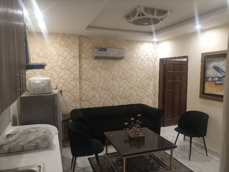 2 BEDROOM FULLY LUXURY FURNISH IDEAL LOCATION EXCELLENT FLAT AVAILABLE FOR RENT IN SECTOR C BAHRIA TOWN LAHORE 2