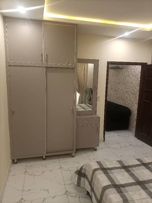 2 BEDROOM FULLY LUXURY FURNISH IDEAL LOCATION EXCELLENT FLAT AVAILABLE FOR RENT IN SECTOR C BAHRIA TOWN LAHORE 7