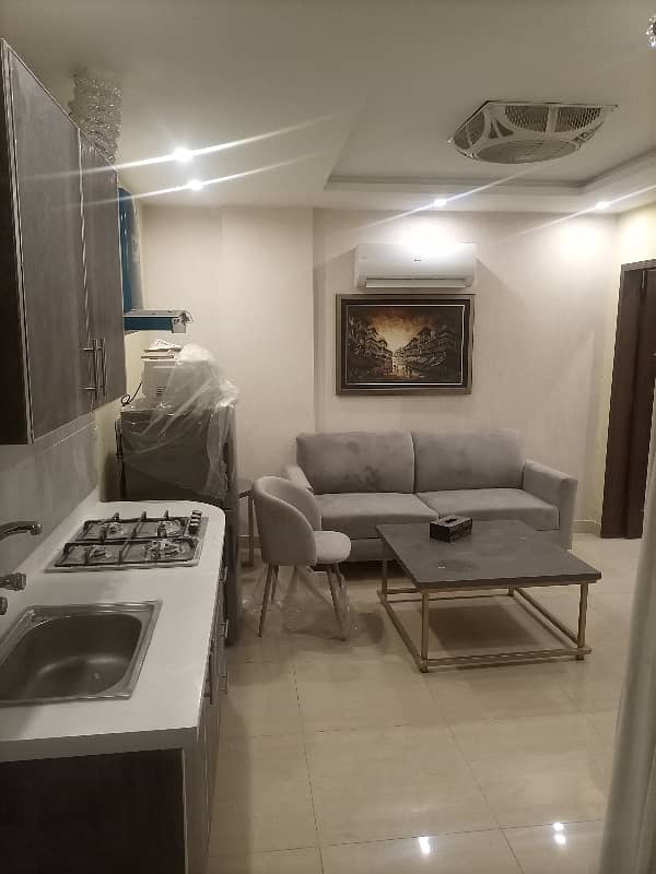 2 BEDROOM FULLY LUXURY FURNISH IDEAL LOCATION EXCELLENT FLAT AVAILABLE FOR RENT IN SECTOR C BAHRIA TOWN LAHORE 11