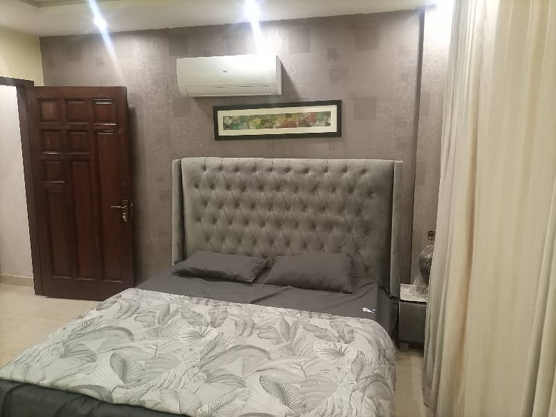 2 BEDROOM FULLY LUXURY FURNISH IDEAL LOCATION EXCELLENT FLAT AVAILABLE FOR RENT IN SECTOR C BAHRIA TOWN LAHORE 17