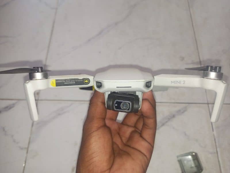 Dji mini 2 for sale 3batteries and batteries box and Remot aur bag 8