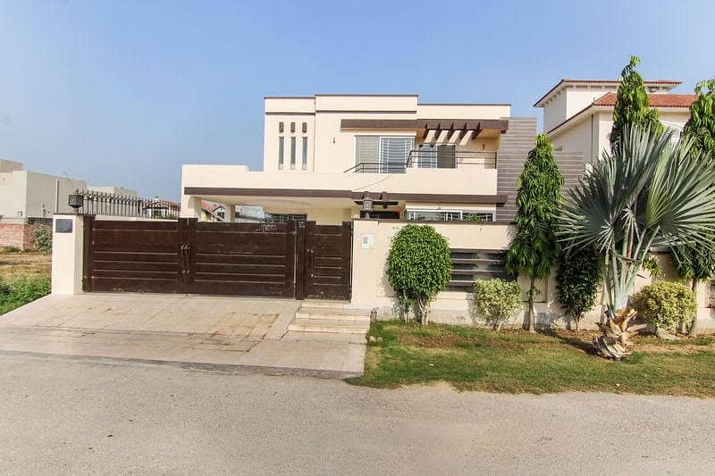 1 Kanal slightly used Unique Modern Design House For Sale at Prime Location of DHA Phase 4 Lahore, Near to park 0