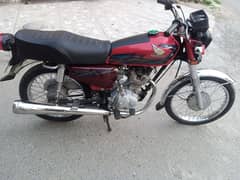 Honda 125 with 69 number