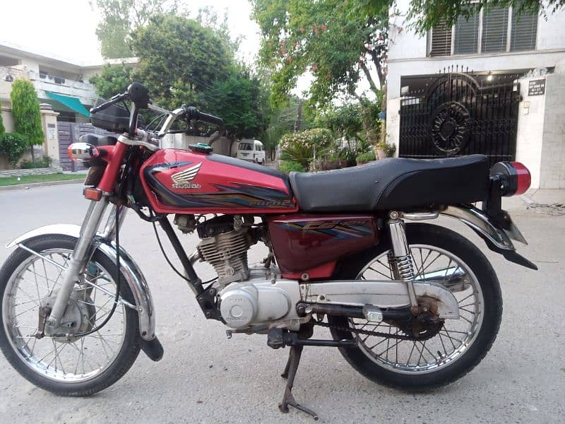 Honda 125 with 69 number 4