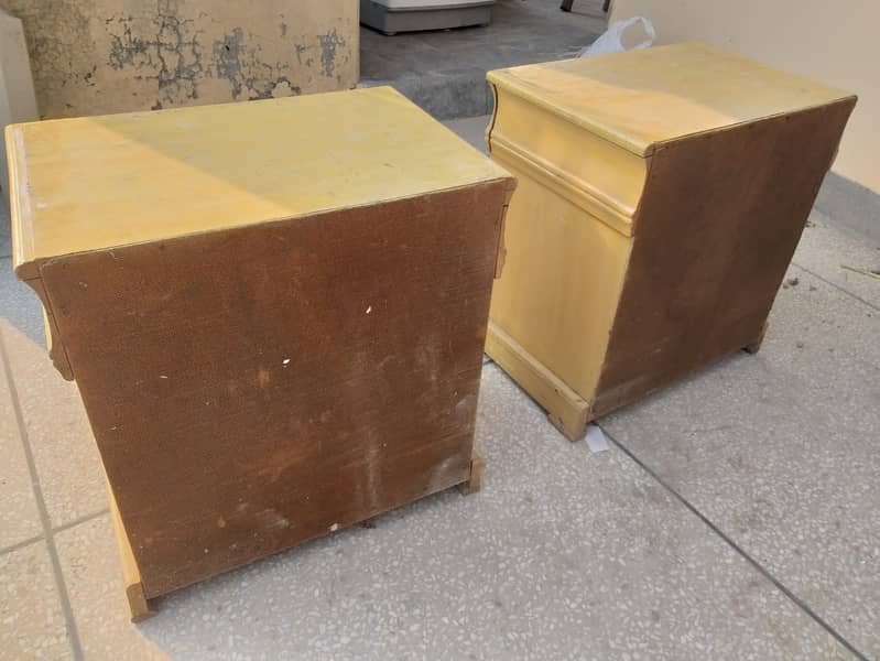 Two used single wooden beds with side tables 10