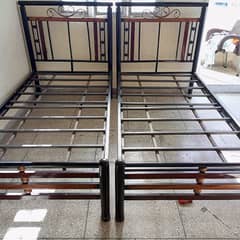 iron single beds