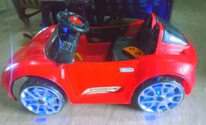 Kids ferrari car,with swing mode ,lights in wheels,music all ok