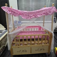 wooden baby cot with swing