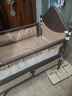 Multi function baby bed in iron with storage