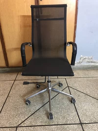 black mesh chair in lush condition