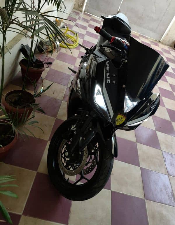 Electric Heavy Sports bike 200km per charge cost 100 pkr 7