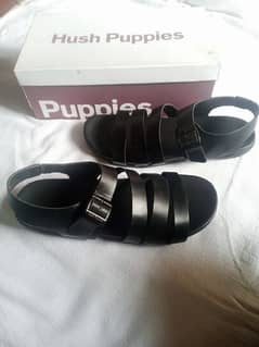 black leather shoes and sandal 0