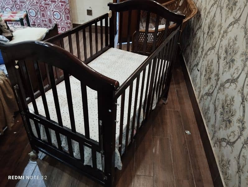 wooden baby cot imported in excellent condition 0