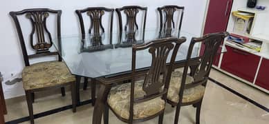 Well maintained modern 6 chairs double glass dining table for Sale