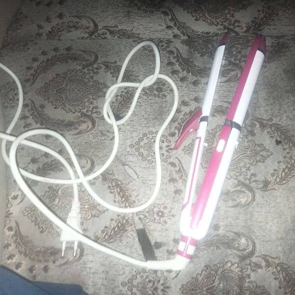 3 in one curler straightener and pucher 0