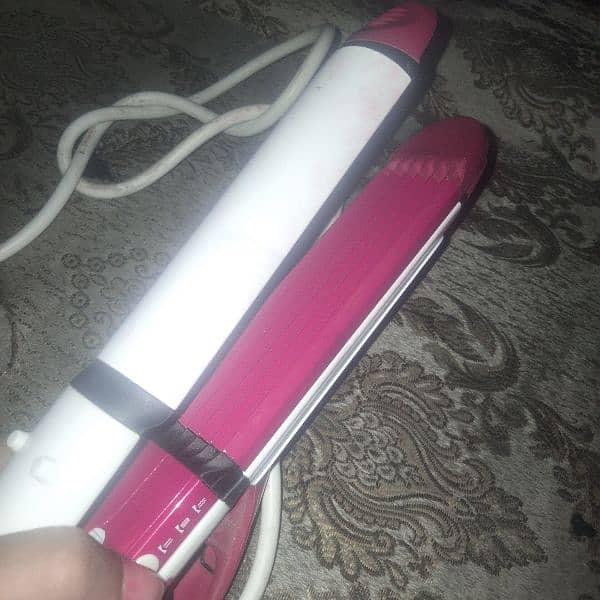 3 in one curler straightener and pucher 1