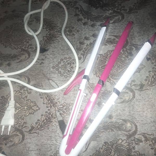 3 in one curler straightener and pucher 2