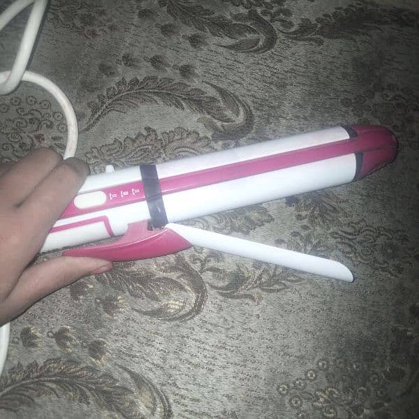 3 in one curler straightener and pucher 3