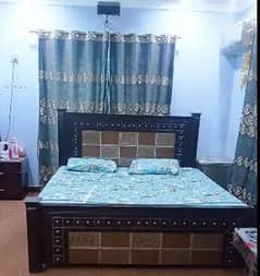 A King Size Double Bed With Mattress slightly used,very good condition