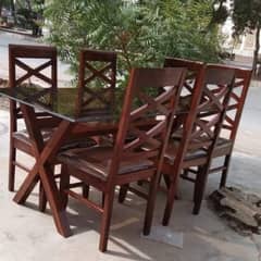 6 seater dining table with brown glass top