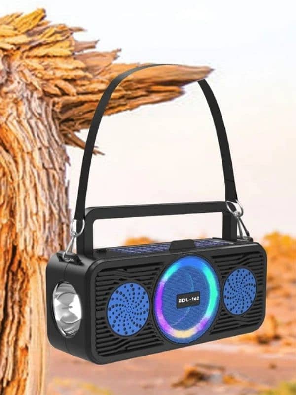 portable Bluetooth speaker with solar charger and tourch 1