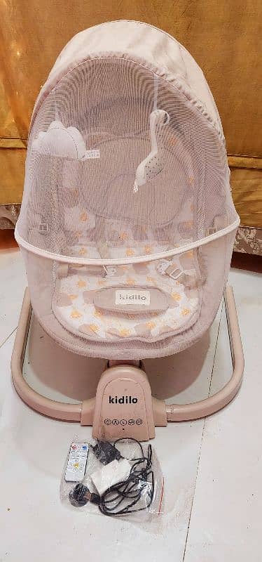 baby swing cot electric with remort skin colour 2