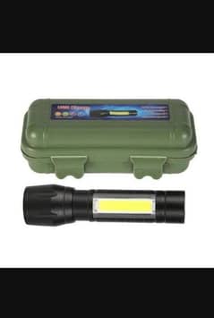 CON Flashlight With Green Box