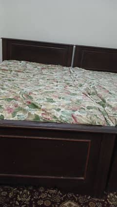 2 single beds with mattress 30000