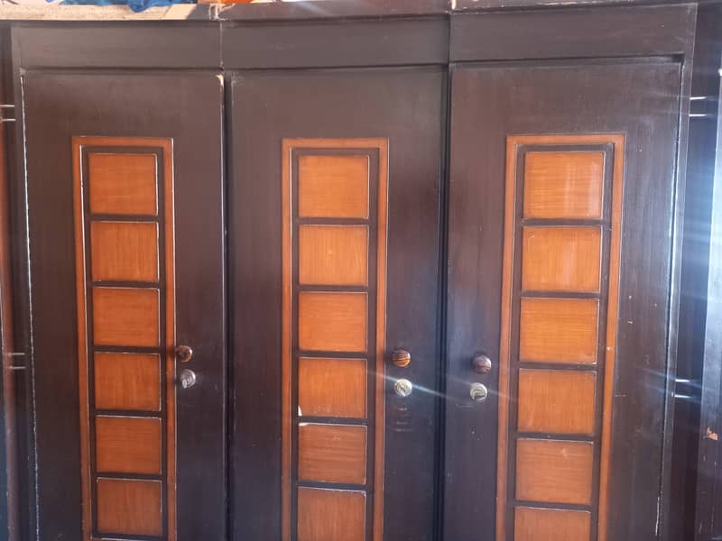 Wooden  3 doors cupboard 4