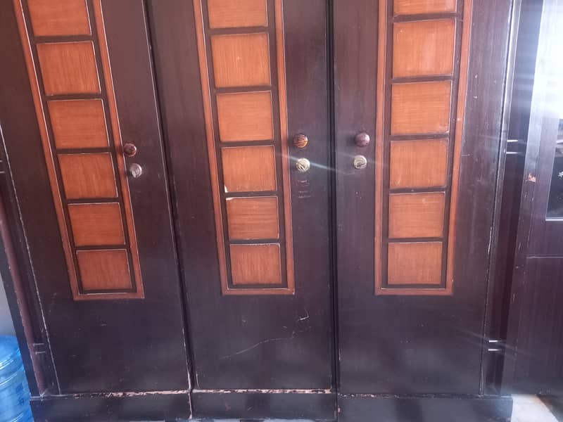 Wooden  3 doors cupboard 5