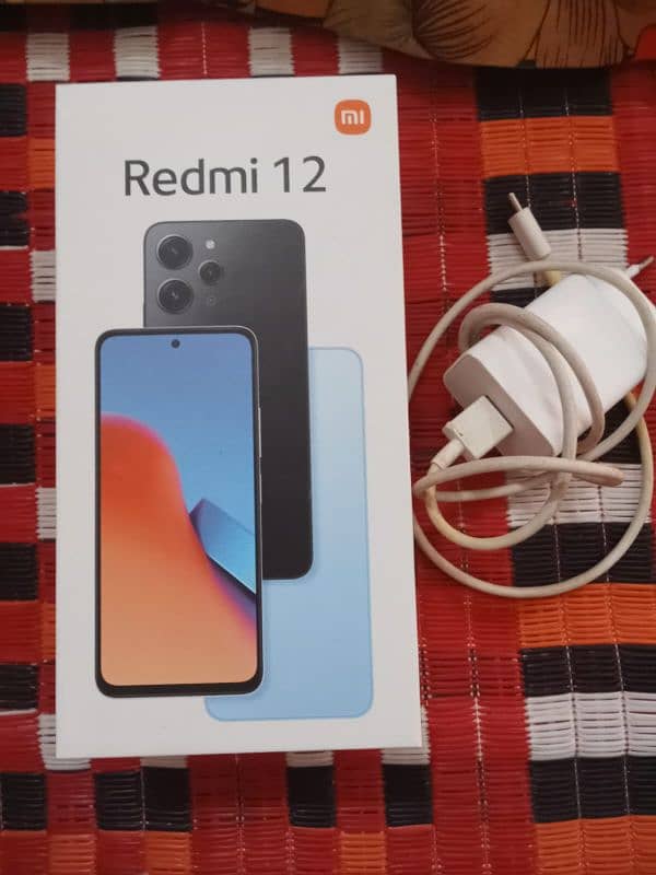 Redmi 12 8+4 gb ram 128 gb storage Box charger available he 2