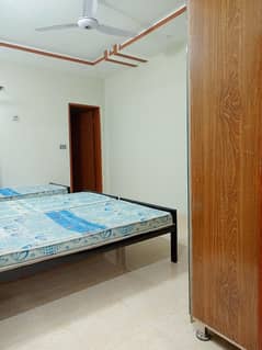 Running hostel building for rent setup for sale in Johar town near Umt university hostels area profitable building