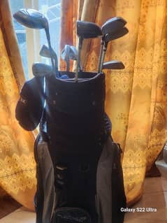 golf bags with clubs