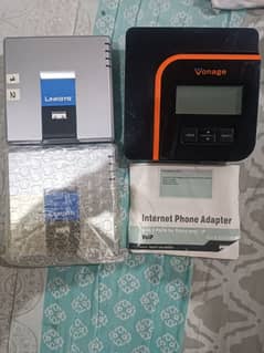 01 Vonage VOIP Device, 02 Linksys PAP2T devices