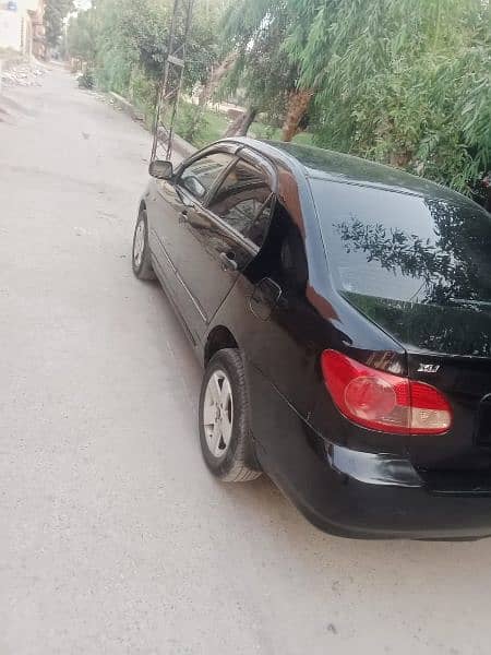 Corolla XLI 308 848 7474 16