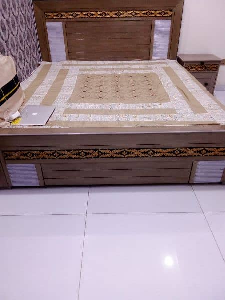 a brand new wooden bed set 1