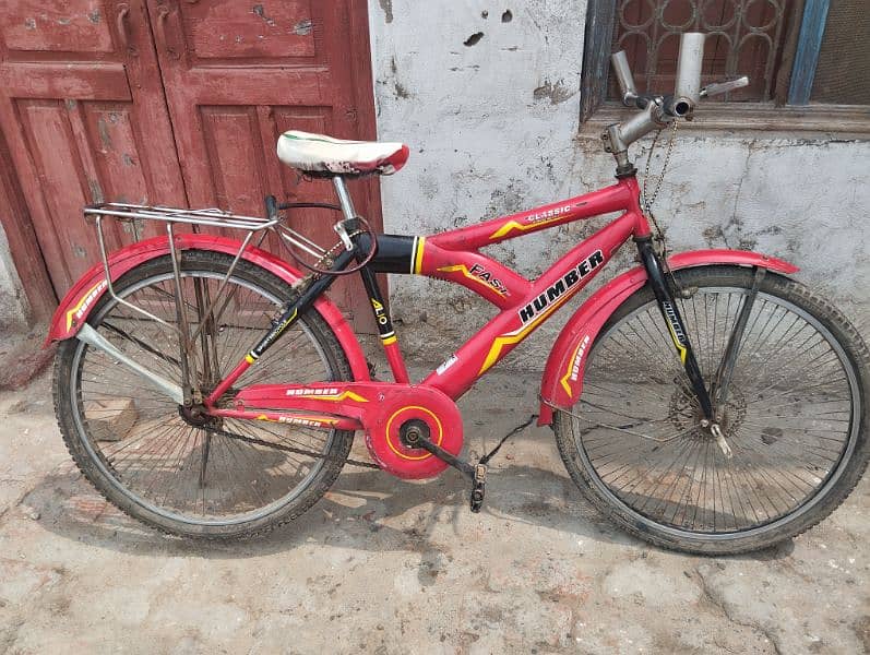 red coloured Humber bicycle 0