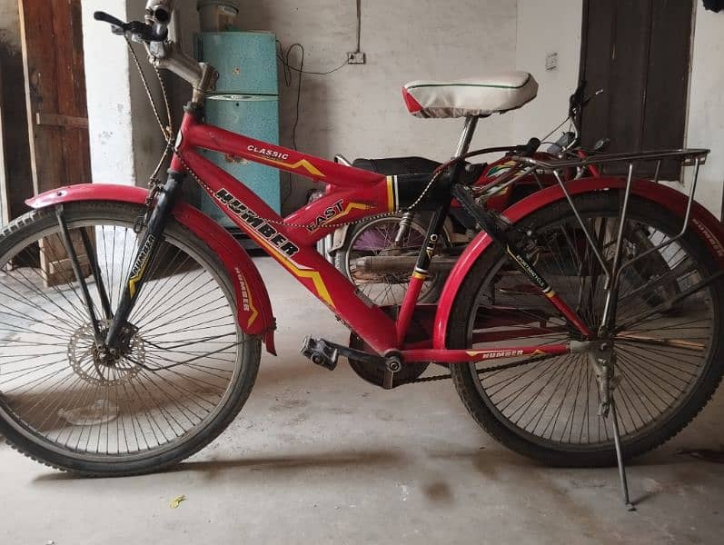 red coloured Humber bicycle 4