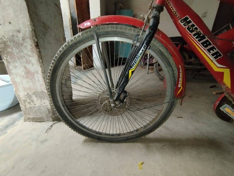 red coloured Humber bicycle 5