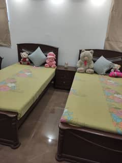 wooden single beds with mattress